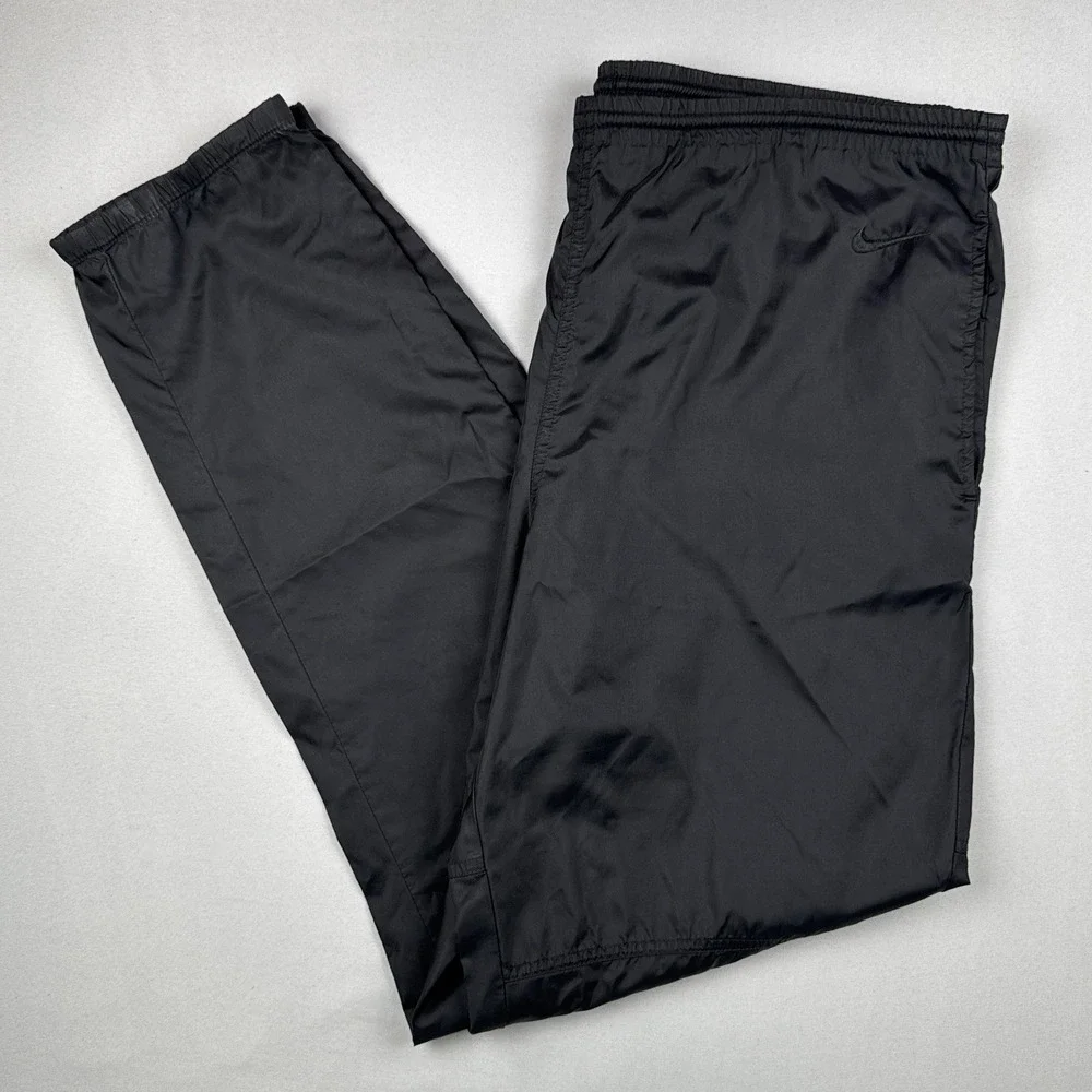 Vintage 90s Nike Black Nylon Track Pants Swoosh Zip Leg Windbreaker L